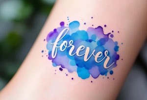 A watercolor-style "forever" in splashes of blue and purple, surrounded by paintbrush strokes. tattoo idea