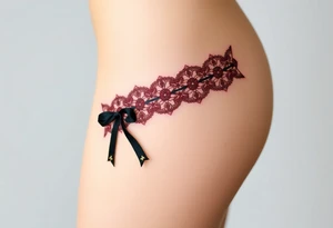 A deep burgundy lace garter tattoo with black velvet ribbon tattoo idea