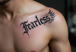 “Fearless” in steel gray Gothic style, flanked by wing motifs in faded charcoal. tattoo idea