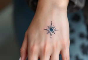 A silver eight-pointed star tattoo suggests clarity, intuition, and a lunar connection. tattoo idea