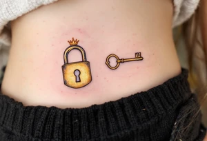 Matching tattoos of gold lock and key, one with a tiny crown, the other with a crown-shaped hole. tattoo idea