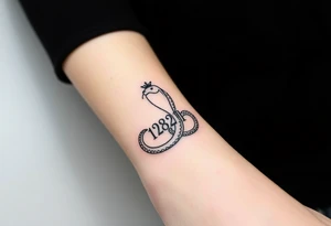 I want a small simple silhouette lines black and white wrist princess like girl snake tattoo that has number 12821 on its body along and also I want it to represent feminine energy crown queen Cycle tattoo idea