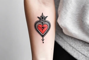 Sacred heart Minimalist and small tattoo on female arm. Inspired by aesthetics. tattoo idea
