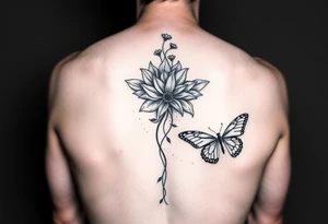 Elegant spine tattoo with lotus flower and butterfly with cracked wings mid back down tattoo idea