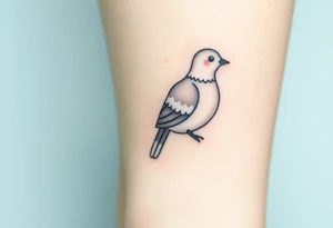 A detailed profile of a collared dove, with shades of light gray and white, its feathers highlighted with hints of silver for a subtle, elegant look tattoo idea