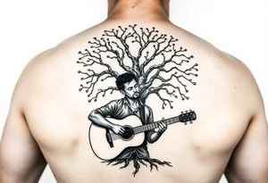 Man playing acoustic guitar underneath tree of life tattoo idea