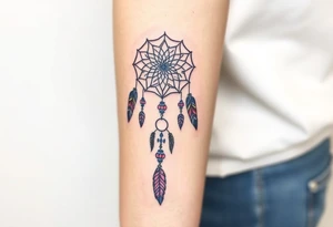native dreamcatcher with flowing feathers and sacred beads tattoo idea