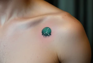 The Capricorn constellation is inked in white against a deep forest green to reflect the zodiac’s earth element. tattoo idea