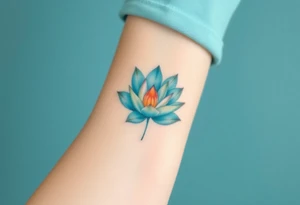 A small water lily tattoo, with light teal and soft peach accents, set in the center of the wrist or ankle, representing personal growth and balance tattoo idea