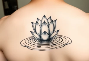 serene lotus flower emerging from sacred waters with ripples tattoo idea