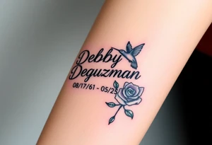Tattoo of the name Debby Deguzman in chunky bold curly cursive with the exact dates of 08/17/61-05/29/25 surrounded by a hummingbird and a rose tattoo idea