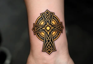 A black and gold Celtic cross, featuring intricate triquetra knots and a radiant golden halo around the center. tattoo idea