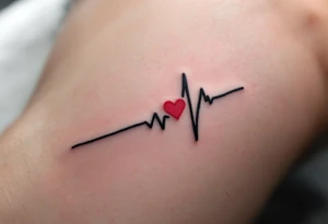 A delicate black and gray EKG line with a small, bright red heart at the end, capturing a heartbeat of love. tattoo idea