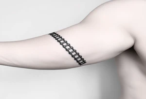 Simple.
An infinite ladder around the right arm like an armband.
Path exploring the universe. tattoo idea