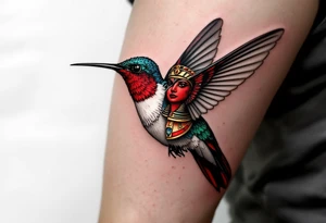 A hummingbird with one side appearing normal and the other side carved in Egyptian stone (red and black only) tattoo idea