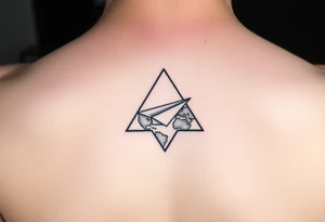 Small geometric triangle with a geometric paper plane flying around the world with fine thin lines tattoo idea