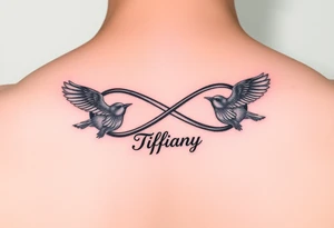 Infinity symbol with birds and the name Tiffany attached to the symbol tattoo idea