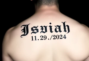 The name Isaiah in old english font and the date 11/29/2024 in Roman numerals tattoo idea