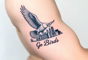 Philadelphia Eagle flying over Philadelphia city skyline faded with a Go Birds written under it tattoo idea