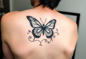 Half butterfly behind ear with swirls tattoo idea