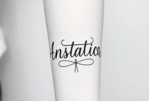 Anastacia in old English cursive font tattoo idea