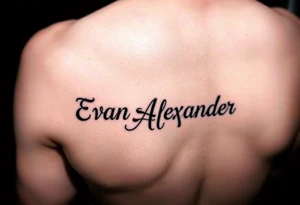 Name tattoo that says Evan Alexander scroll 
on forearm tattoo idea