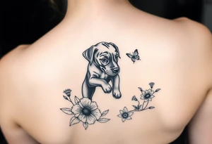 Small tattoo of Great Dane puppy playing in flowers and chasing a butterfly. tattoo idea