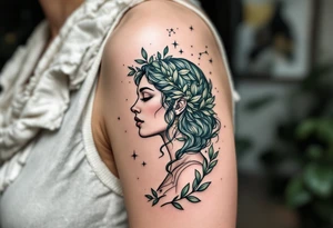 A cosmic Virgo constellation etched in teal above the profile of a woman surrounded by olive leaves. tattoo idea