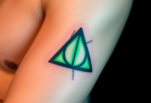 A Deathly Hallows full symbol etched into an ancient-looking stone, with deep cracks and glowing runes in eerie green light tattoo idea