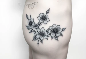 Hip and thigh tattoo with Thinner lines and flowers something dainty but also bohemian with maybe a touch of an insect or small animal tattoo idea