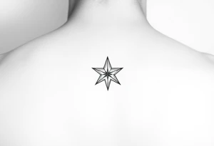 A star tattoo design. . black and white. small tattoo idea
