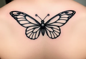 dainty butterfly with swirls coming from both wings tattoo idea