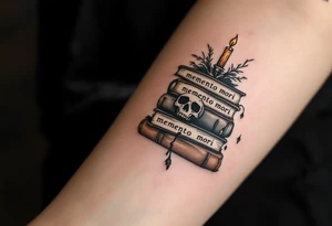 A pile of old books in dusty browns and grays, topped with a candle and skull, "memento mori" inked across the spines. tattoo idea