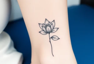 A detailed black and white water lily tattoo, shaded in elegant grayscale with hints of deep blue for depth, representing timeless love and simplicity tattoo idea