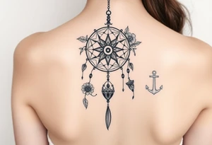 Boho dream catcher with compass and anchor Beautiful flowers and an ornamental chandelier like look tattoo idea