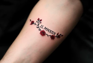 I.I.MMXIX written in pure black ink along the forearm with red rose vines delicately wrapping around. tattoo idea