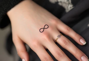 A rose band with a small infinity symbol tattoo idea
