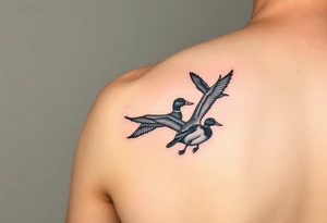 ducks flying in a swmap on outside of forearm with a wood duck and mallard tattoo idea