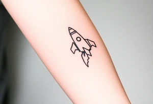 Rocket ship with letters K and J somewhere on it tattoo idea