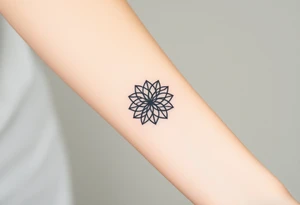 A minimalist black ink Flower of Life, centered on the forearm, with perfect geometric symmetry tattoo idea