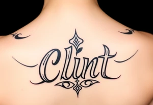 Clint spelled out in cartoon lettering tattoo idea
