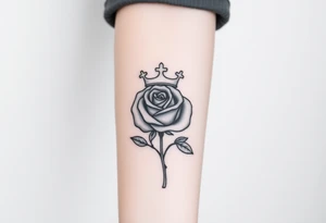 A rose with a large kings 
crown on-top of it tattoo idea