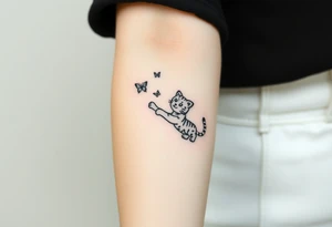 Tiger cub stretching catching 3 butterflies tattoo idea