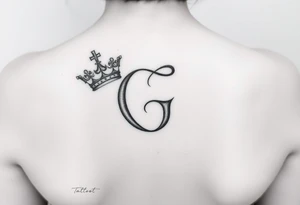 a capital G letter with a crown tilted to the left of it tattoo idea