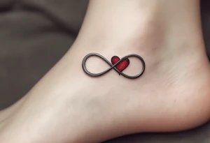 A silver infinity symbol with a deep crimson heart woven into one side. tattoo idea