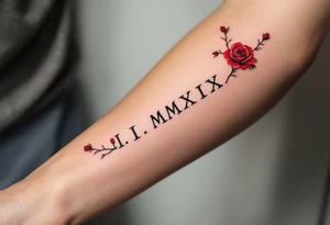 I.I.MMXIX written in pure black ink along the forearm with red rose vines delicately wrapping around. tattoo idea
