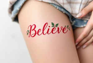 "Believe" in vibrant red with floral accents in soft pink and green, representing growth and perseverance. tattoo idea