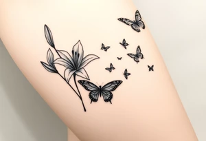 5 to 7 lily blooms in a natural stager with 2 that have petals floating off that gradually dissolve into butterflies in various stages of flight tattoo idea