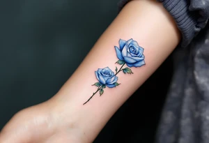 Miniature blue roses outlined in black, with watercolor shading for a dreamy, surreal effect. tattoo idea