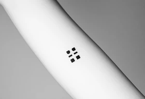A small ";" symbol tattoo idea